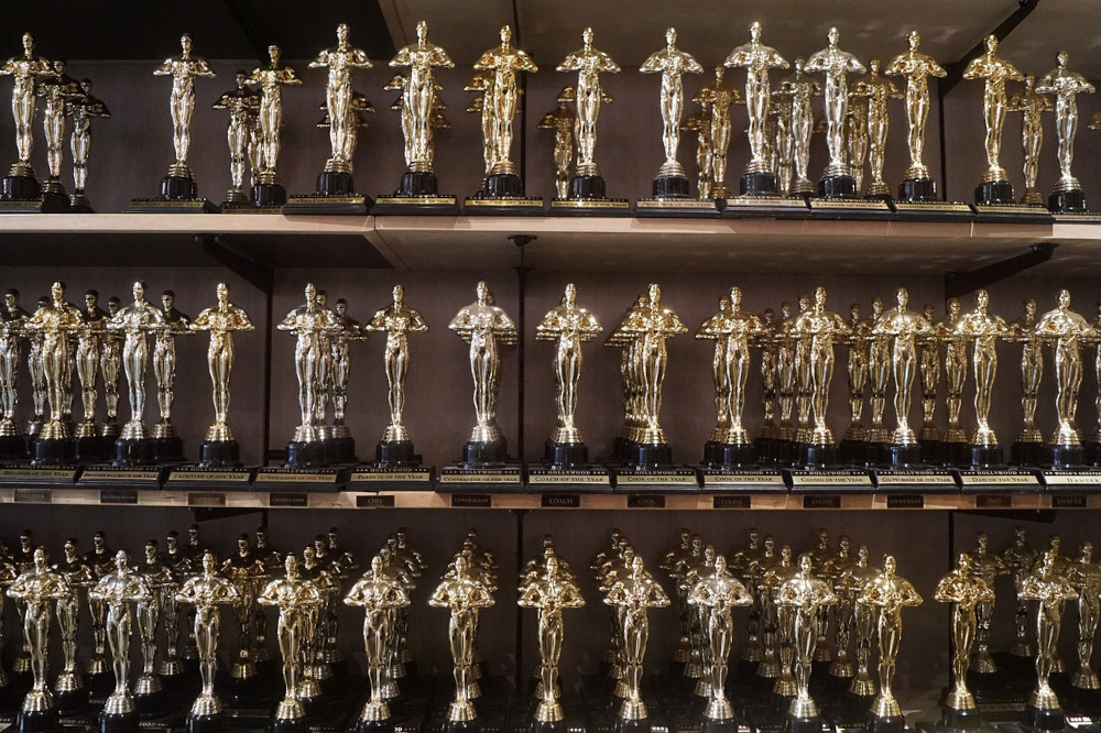 Shelves with rows of many many Oscars award statues on them, waiting to be given out at the Academy Awards ceremony on March 27th, 2022. Movie buffs can place wagers on their favorite picks at DraftKings NJ