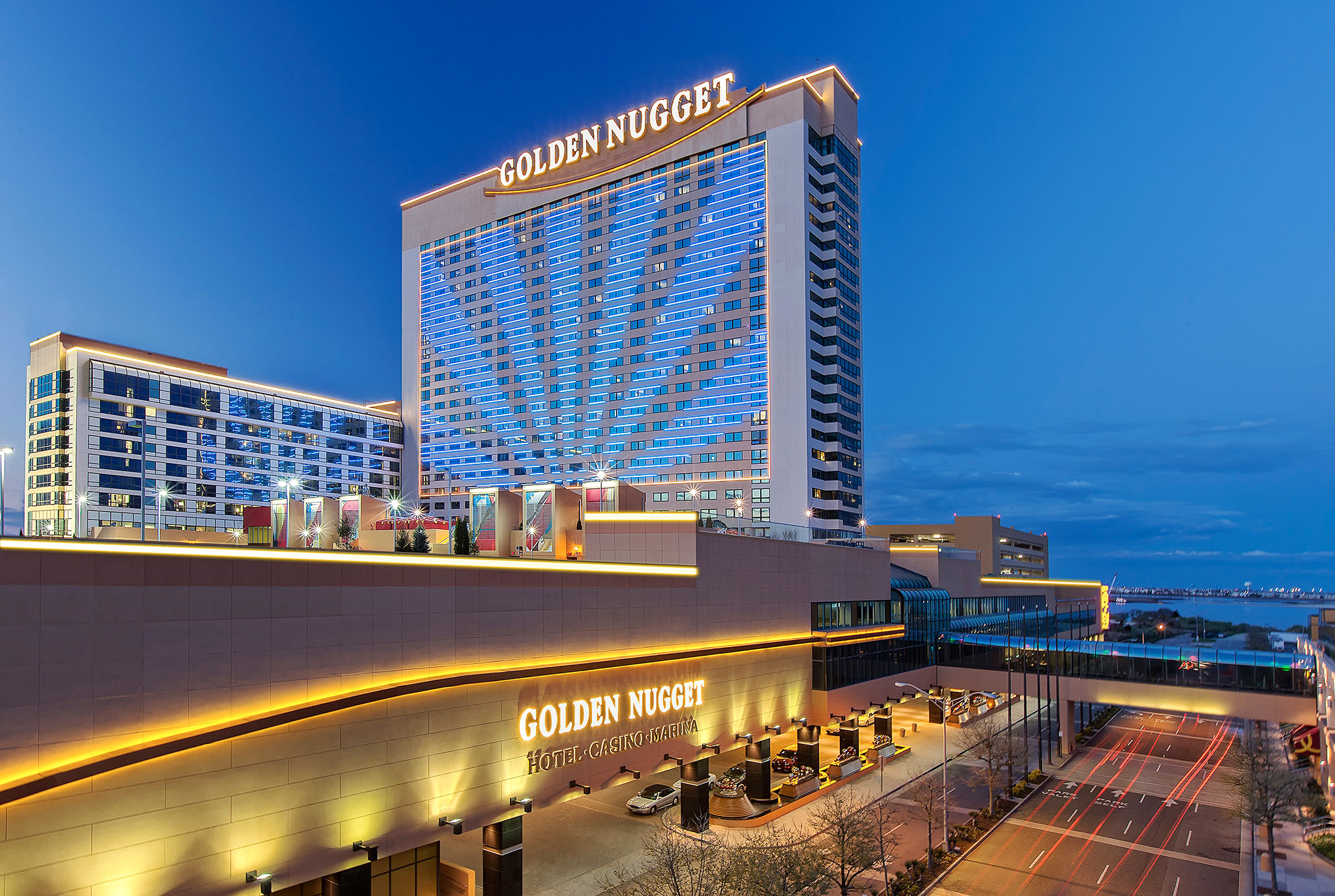 The exterior of the Golden Nugget Casino Hotel in Atlantic City is seen at dusk. NJ Online Casino Revenue Rebound