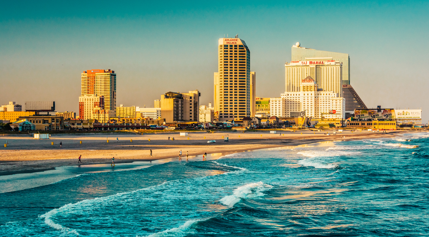 The skyline and Atlantic Ocean in Atlantic City, New Jersey. at sunset. NJ's Online Casinos Already Made Record Revenue in 2022